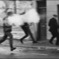 Man running to safety of pub door